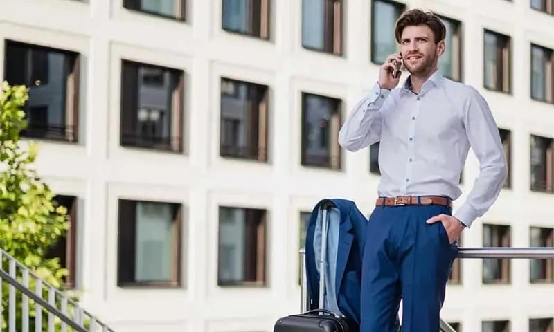 Man in suit with phone
